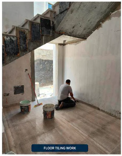 Floor tiling and finishing beneath staircase